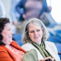 Associate dean Karen Gipson chats with Deana Wiebel before her presentation.